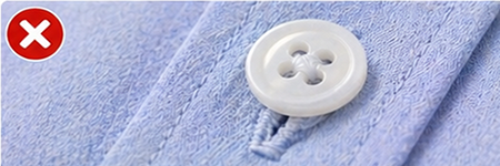 Weak button attachment