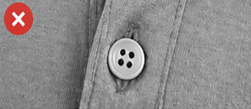 Loose polo button