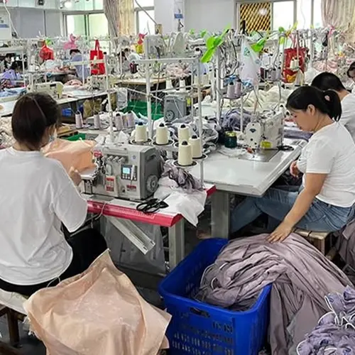 Garment production team assembling custom clothing